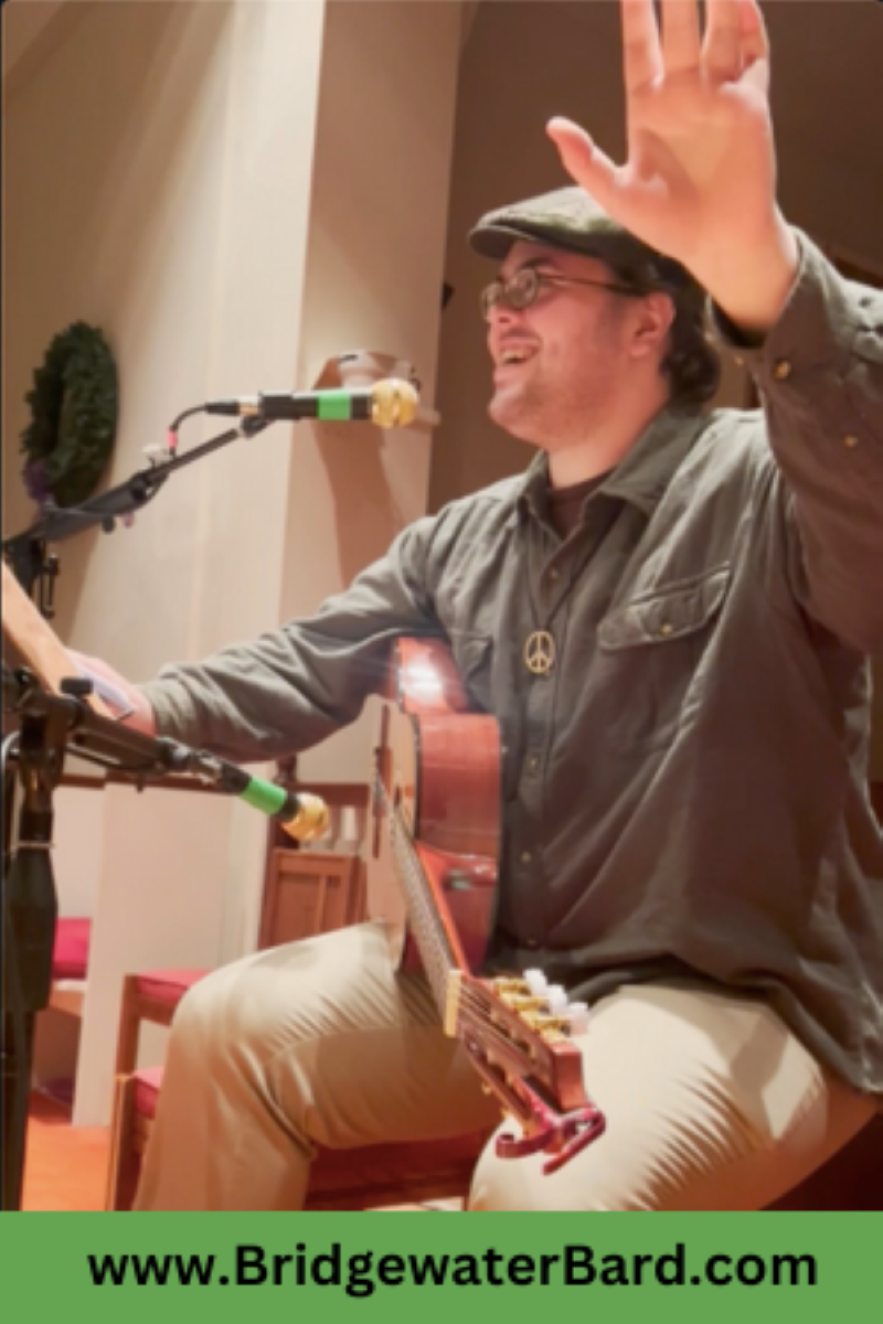 picture of Thomas Kelley in front of microphone