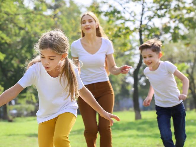 three kids playing outside