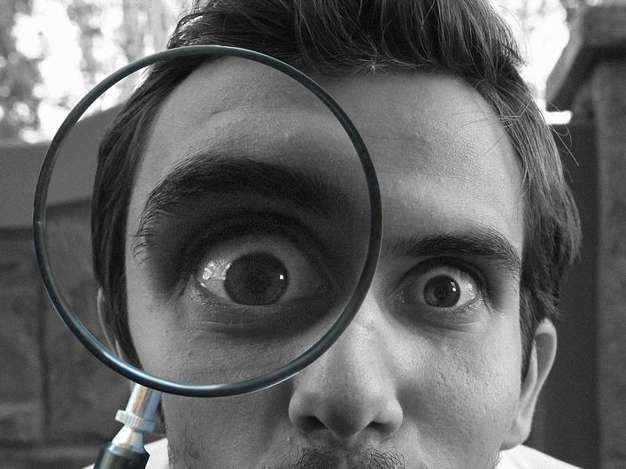 Man with magnifying glass