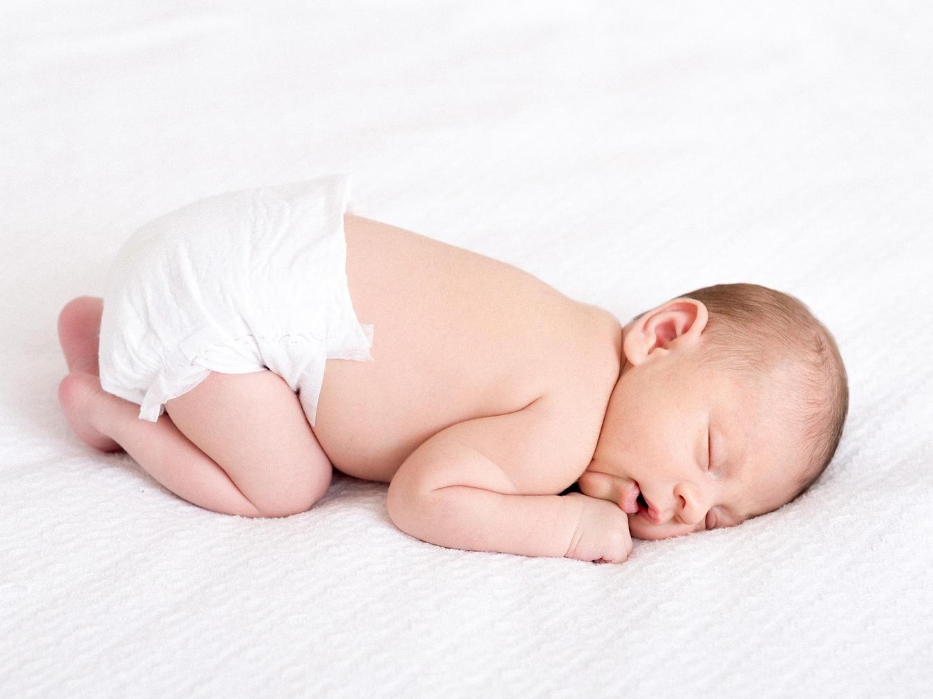 sleeping baby in a diaper